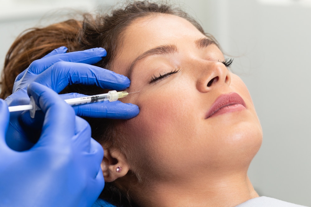A woman getting a cosmetic dermatology treatment