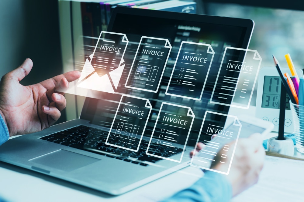 Digital dermatology billing and claims management system displayed on laptop